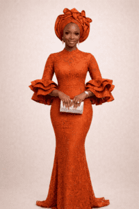 Orange Lace High‑Neck Gown with Ruffle Sleeves